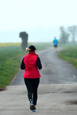 Joggers running cross country